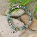 Armband aus Silber und Perlen mit FACETTIERTEN SILBERKUGELN auf Kautschuk