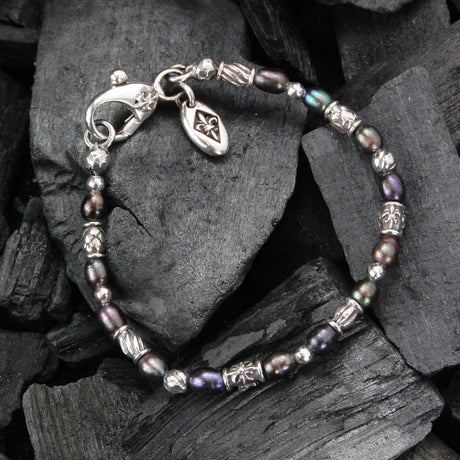 Silbernes Armband aus Mini-Decor Röhren und Kreuzkugeln