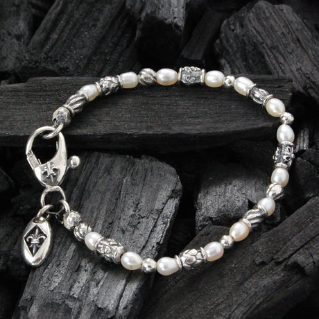 Silbernes Armband aus Mini-Decor Röhren und Kreuzkugeln