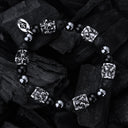 Silberarmband mit Perlen und Lilienröhren