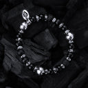 Armband aus Silber und Perlen mit FACETTIERTEN SILBERKUGELN auf Kautschuk