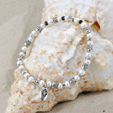Silver Bracelet with Triple Mini SKULLS and genuine Pearls on Rubber 5