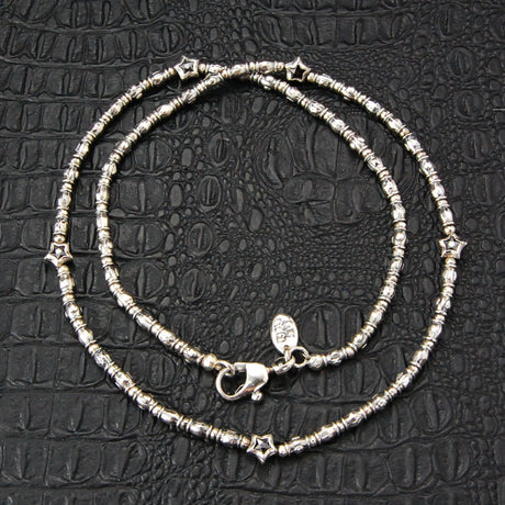 Silberne Halskette mit Mini-RÖHRCHEN und KUGELN Rough und Mini-STERNEN