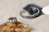 Silberring mit Eisen, Klingen und Lanzenkreuzen