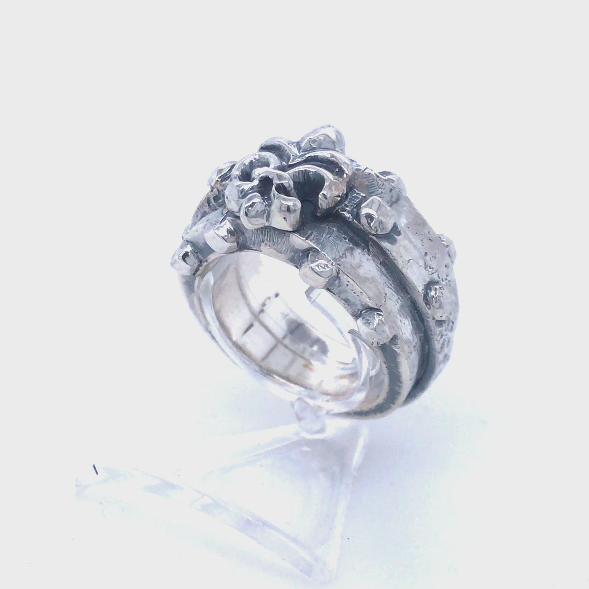 Silver Ring Faceted Body with Rivets and Upright Lily